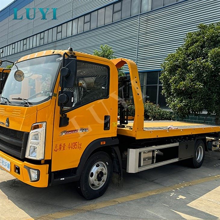 HOWO 7T Rollback Flatbed Road Wrecker Truck price