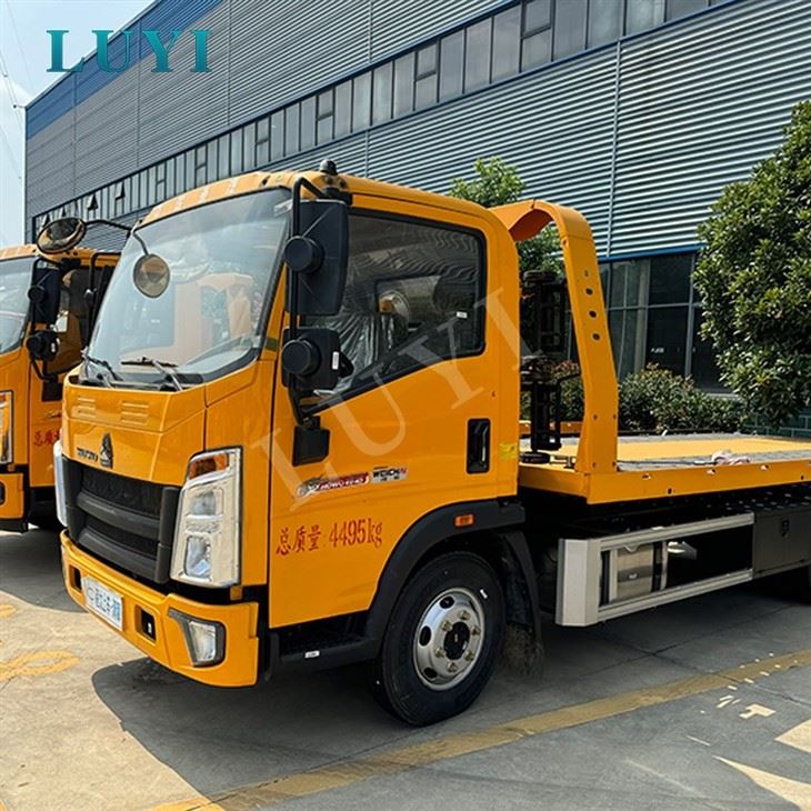 HOWO 7T Rollback Flatbed Road Wrecker Truck price